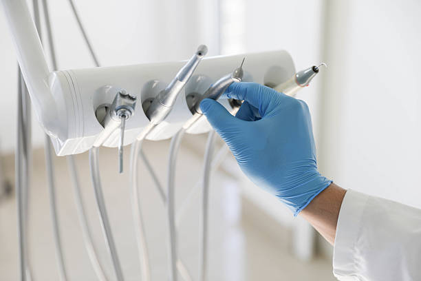 Professional Tooth Extraction technician working in Clifton, IL